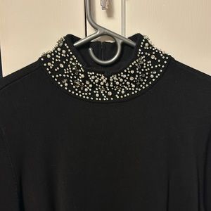 Chico’s black holiday sweater with bling accents. New with tags size2 =10/12
